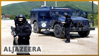 Kosovo Serbs rally in North Mitrovica against police raids [upl. by Nomelc]